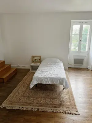 Un ou plusieurs lits dans un hébergement de l'établissement Gîte des Lavandières en bordure de Vienne (Civaux)
