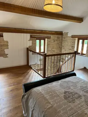 Un ou plusieurs lits dans un hébergement de l'établissement Gîte Chez Père Thomas pour 2-3 pers