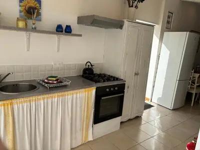 Cuisine ou kitchenette dans l'établissement Gîte des Tournesols