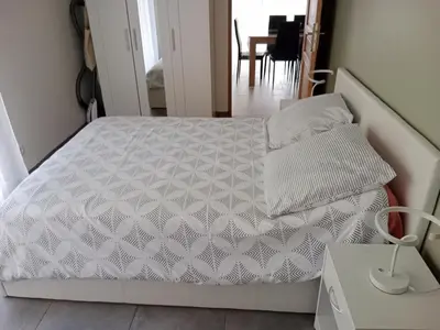Un ou plusieurs lits dans un hébergement de l'établissement Maison Dominique