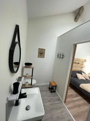 Un ou plusieurs lits dans un hébergement de l'établissement Maison Les Iris - 3 chambres et 3 salles de bain - 3 à 6 personnes - Futuroscope