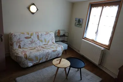 Coin salon dans l'établissement Gîte Férolle