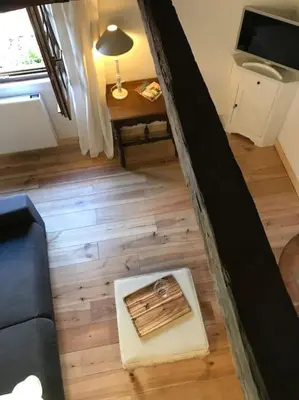 Télévision ou salle de divertissement dans l'établissement Petite Maison médiévale