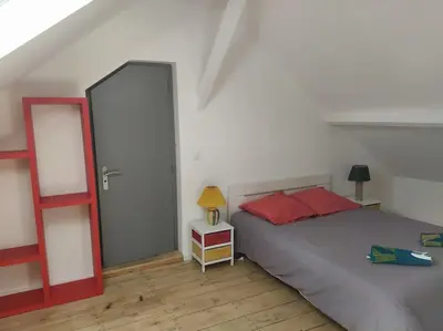 Un ou plusieurs lits dans un hébergement de l'établissement le loft de la place du marché