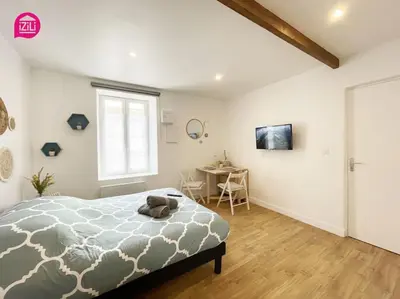 Un ou plusieurs lits dans un hébergement de l'établissement Le Studio Marin by CozyLife - Centre Ville - Gare