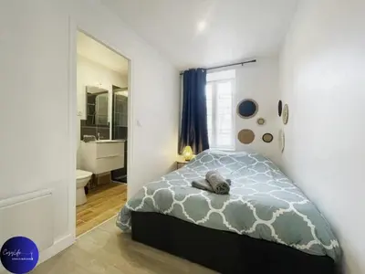 Un ou plusieurs lits dans un hébergement de l'établissement Le Duplex Niortais by CozyLife - Calme et Cosy