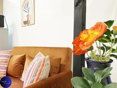 Coin salon dans l'établissement Le Duplex Niortais by CozyLife - Calme et Cosy