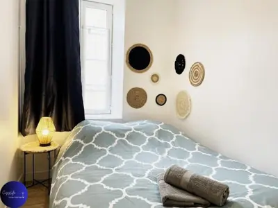 Un ou plusieurs lits dans un hébergement de l'établissement Le Duplex Niortais by CozyLife - Calme et Cosy