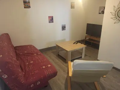 Télévision ou salle de divertissement dans l'établissement Maison de ville