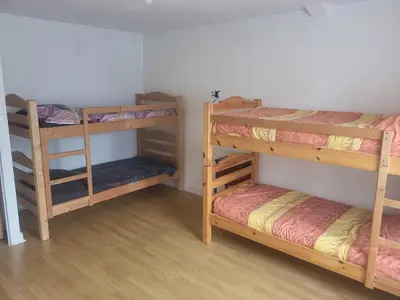 Un ou plusieurs lits dans un hébergement de l'établissement Maison de ville
