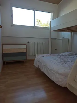Un ou plusieurs lits dans un hébergement de l'établissement Appart'cosy - 7 personnes