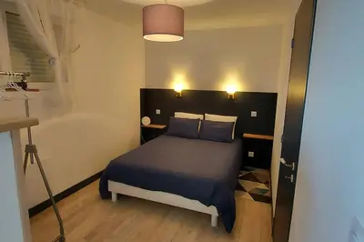 Un ou plusieurs lits dans un hébergement de l'établissement Gîtes Le Saint Martin Le Cosy 1 - 4 pers