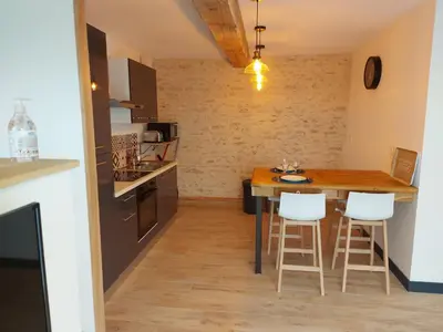 Cuisine ou kitchenette dans l'établissement Gîtes Le Saint Martin Le Cosy 1 - 4 pers