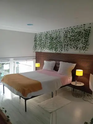 Un ou plusieurs lits dans un hébergement de l'établissement Appartement Chasseneuil Futuroscope