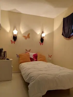 Un ou plusieurs lits dans un hébergement de l'établissement Appartement Chasseneuil Futuroscope