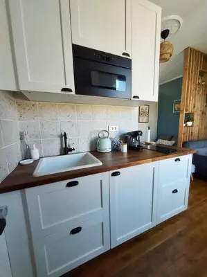 Cuisine ou kitchenette dans l'établissement Appartement lumineux proche Futuroscope