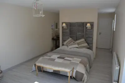 Un ou plusieurs lits dans un hébergement de l'établissement Aux 4 Cornes - Chambre d'hôtes