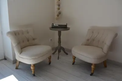 Coin salon dans l'établissement Aux 4 Cornes - Chambre d'hôtes
