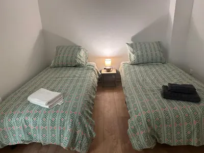 Un ou plusieurs lits dans un hébergement de l'établissement Maison paisible, 15 min du Futuroscope & Arena.