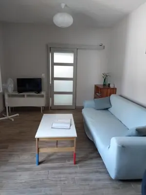 Télévision ou salle de divertissement dans l'établissement Le spiti, maison agréable avec stationnement privatif