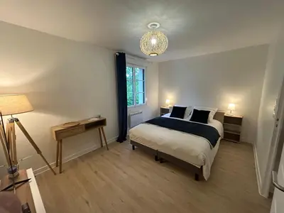 Un ou plusieurs lits dans un hébergement de l'établissement Le Clos des Lilas