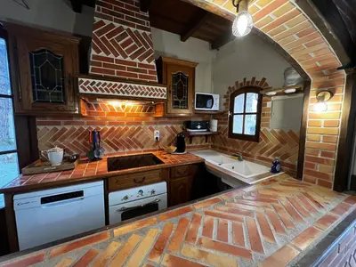 Cuisine ou kitchenette dans l'établissement Gîte Ebéon