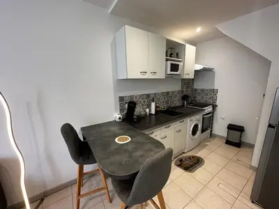 Cuisine ou kitchenette dans l'établissement Le Saint Maixent, Maison de Ville, Baby Foot, wifi