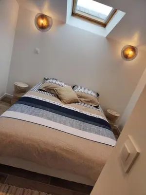 Un ou plusieurs lits dans un hébergement de l'établissement La maisonnette d'Anaïs