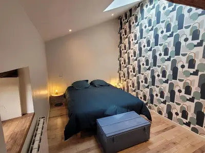 Un ou plusieurs lits dans un hébergement de l'établissement Maison Poitevine 9/10 personnes