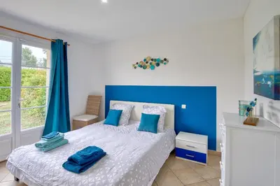 Un ou plusieurs lits dans un hébergement de l'établissement Villa Migron - Charmante maison avec piscine