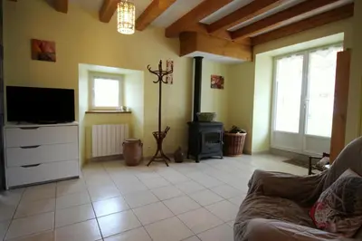 Télévision ou salle de divertissement dans l'établissement Mazette