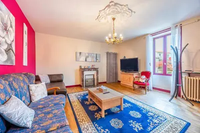 Télévision ou salle de divertissement dans l'établissement Chambre Rêve américain