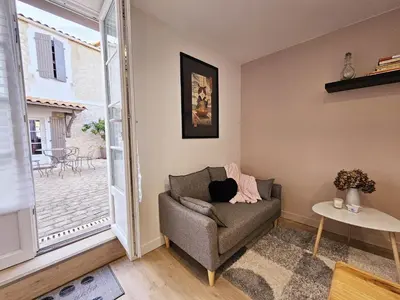 Coin salon dans l'établissement Côté cour chaleureuse maison de ville