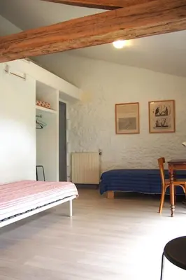 Un ou plusieurs lits dans un hébergement de l'établissement Hameau de la Brousse