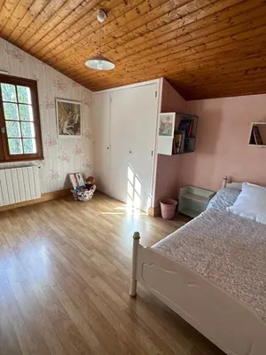 Un ou plusieurs lits dans un hébergement de l'établissement Maison de campagne cosy dans la verdure
