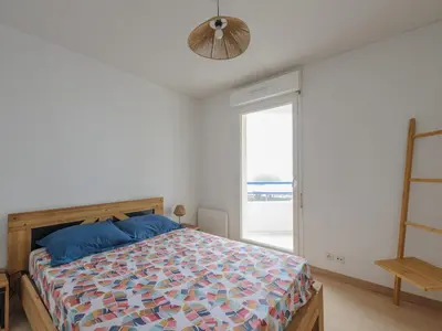 Un ou plusieurs lits dans un hébergement de l'établissement Appartement Calme avec Grande Terrasse, Aytré, Proche Lac, 2 Pers. - FR-1-258-213