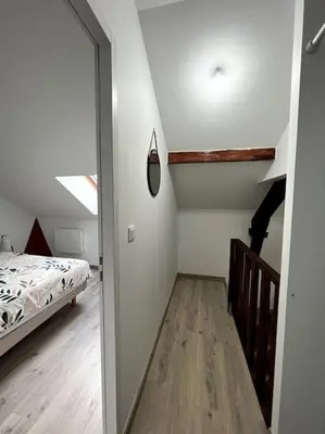 Un ou plusieurs lits dans un hébergement de l'établissement Le Duplex Tout Confort