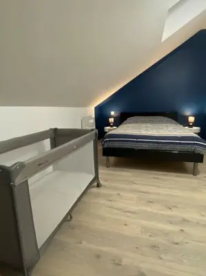 Un ou plusieurs lits dans un hébergement de l'établissement Le Duplex Tout Confort