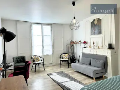 Coin salon dans l'établissement Le Grand'rue - Centre Ville - Confort