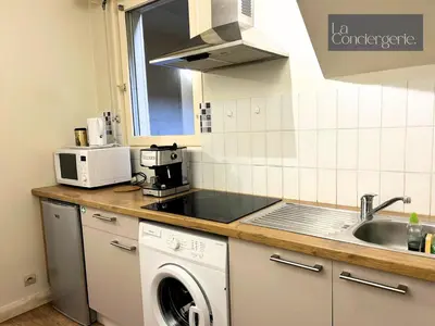 Cuisine ou kitchenette dans l'établissement Le Grand'rue - Centre Ville - Confort