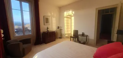 Un ou plusieurs lits dans un hébergement de l'établissement Villa Art Nouveau