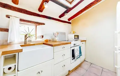 Cuisine ou kitchenette dans l'établissement Le Vieux Fournil