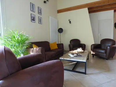 Coin salon dans l'établissement La Patte Charentaise Parking gratuit Le calme en ville