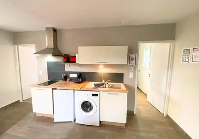 Cuisine ou kitchenette dans l'établissement Aux Pommiers - Poitiers CHU - CAMPUS - La Conciergerie