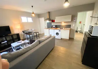 Cuisine ou kitchenette dans l'établissement Aux Pommiers - Poitiers CHU - CAMPUS - La Conciergerie