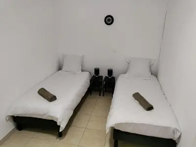 Un ou plusieurs lits dans un hébergement de l'établissement Maison cocooning