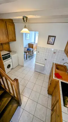 Cuisine ou kitchenette dans l'établissement Maison de village classé petite cité de caractère