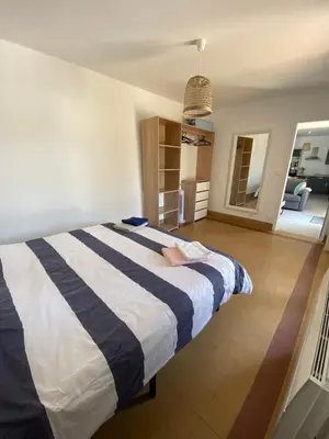 Un ou plusieurs lits dans un hébergement de l'établissement Maison 4 personnes avec Jardin, à 200 m de la Plage