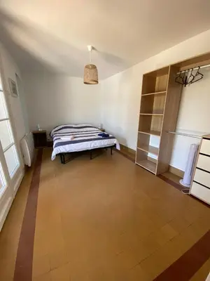 Un ou plusieurs lits dans un hébergement de l'établissement Maison 4 personnes avec Jardin, à 200 m de la Plage