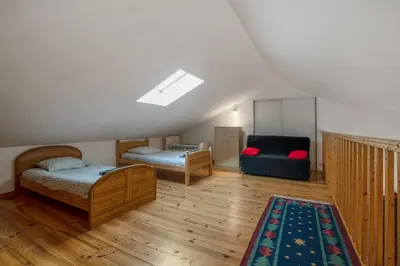 Un ou plusieurs lits dans un hébergement de l'établissement Villa Vanille